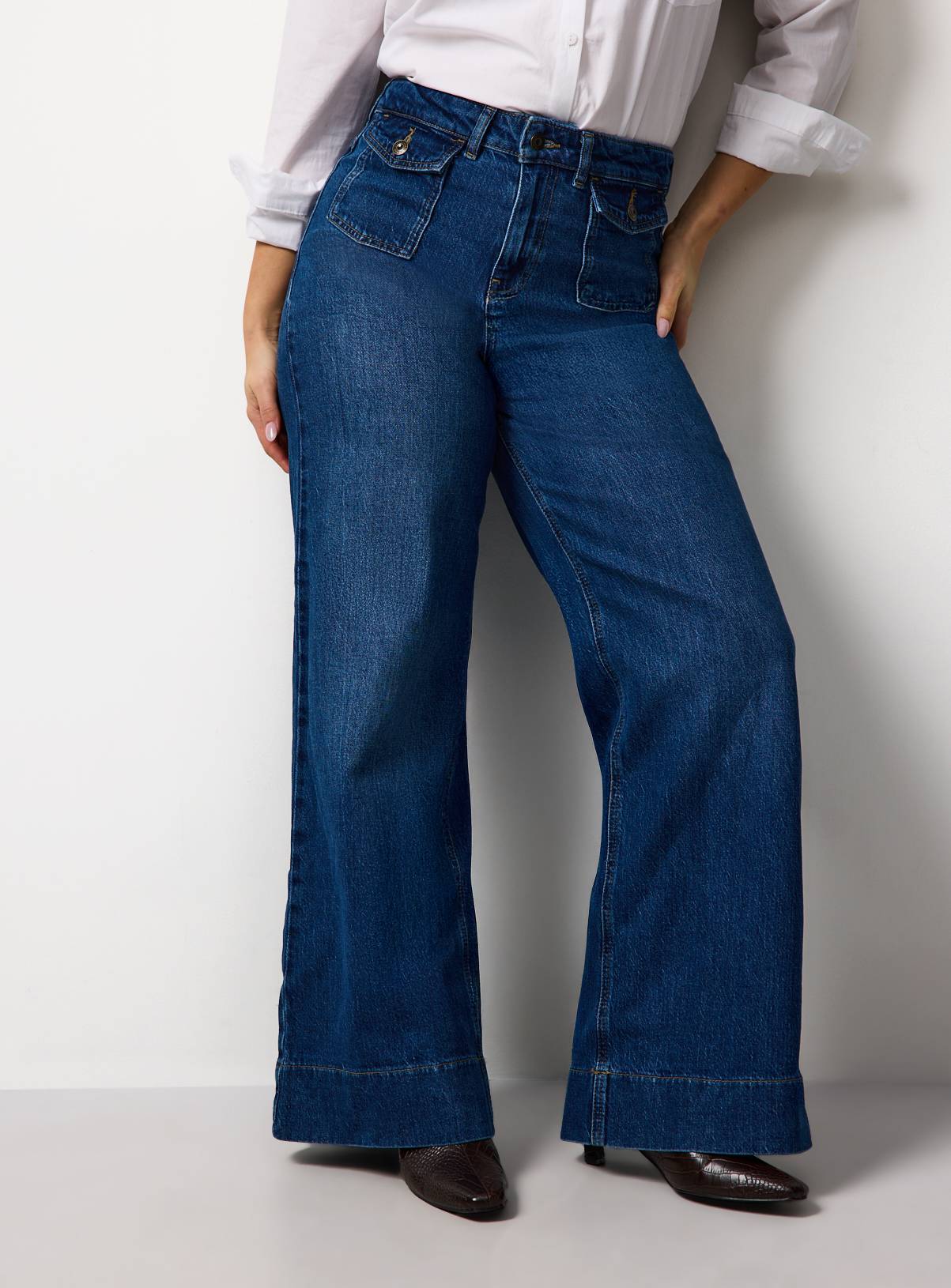 The Mid Blue Flared Leg Denim Jeans 10R - Image 1